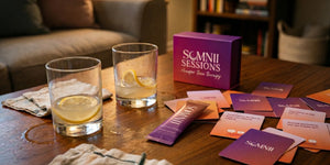 Two glasses with lemon slices, a box labeled 'SOMNII Sessions', and cards on a wooden table.