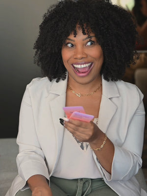 A mom reacting to a Somnii Session card, showcasing the fun aspect of the game. 